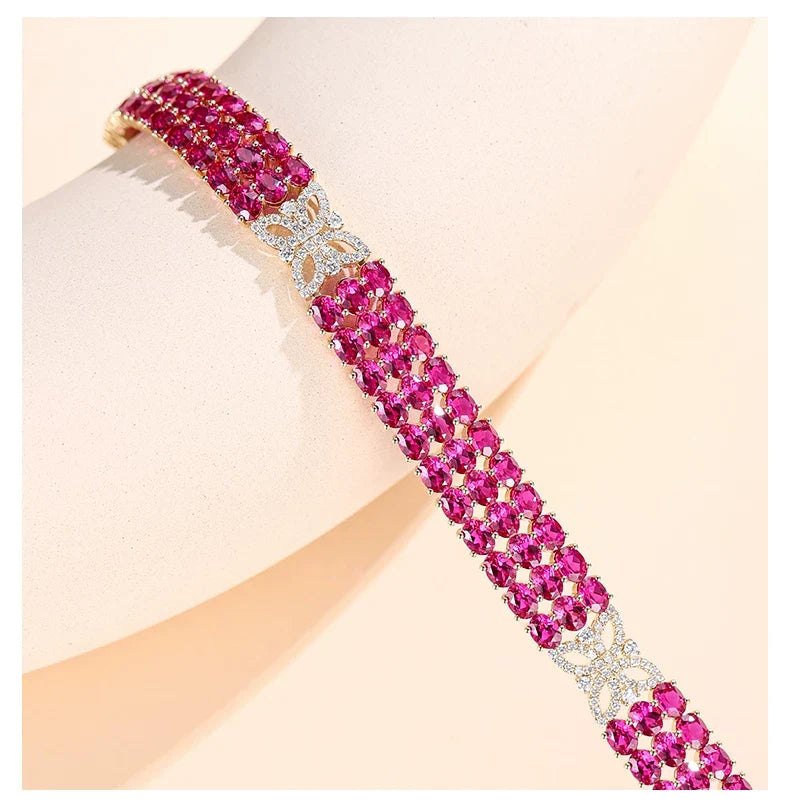 18K Yellow Gold Four-Leaf Clover Ruby Bracelet, approx. 23 g total weight